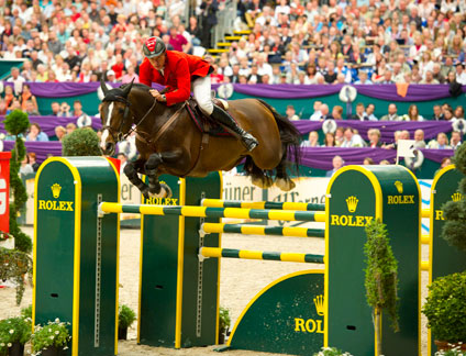 Germany's Christian Ahlmann clears the Rolex Swedish oxer