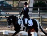 galway01_mcmanamy Maxance McManamy rides the dressage test on her flashy black-and-white pinto Trakehner, Project Runway.