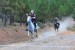 ReynoldsRacing_featuredimage Jeremy Reynolds gallops across the finish line on his gray Arabian at the NAERTC championship, with another rider in hot pursuit.