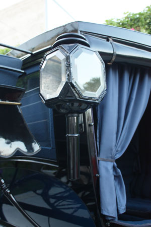 Beveled glass detail on the lighting of the Curtain Coach.