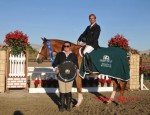 John Bragg and Castle Hill pose with trophy with the horse's owner Stephanie Ray