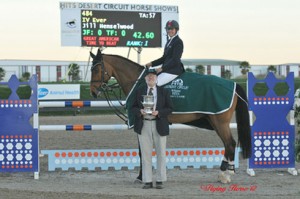 Jill Henselwood, astride IV Ever, accepts her trophy from HITS' Tony Hitchcock.