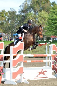 James Alliston and Jumbo's Jake during the stadium jumping phase of a 3 day event.