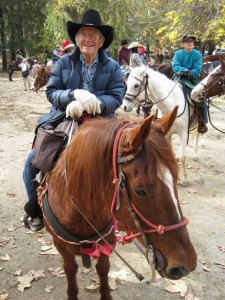 Bert Bonnett aboard his chestnut mare Cassie.