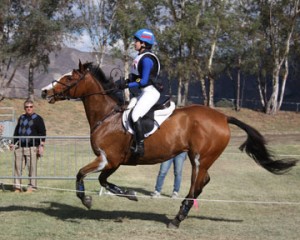 20-year-old rider Nina Ligon rides Jazz King at a full gallop over the cross country course.