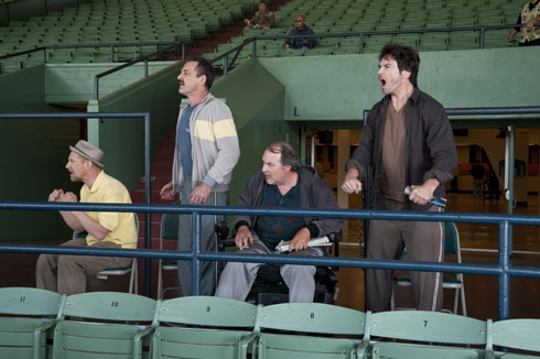 Cast of motley race track hangers on in the grandstand bleechers.