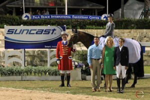 Meredith Michaels-Beerbaum accepts her trophy with Cantano.