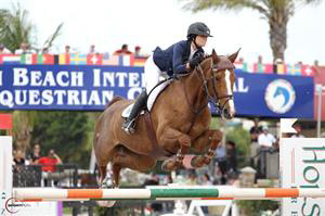 Reed Kessler and Cylana clear a vertical jump.