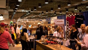 Vendors and shoppers in the exhibit hall.