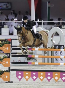 Edwina Tops-Alexander jumps Itot du Chateau, a small chestnut gelding.