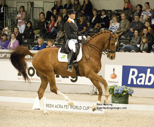 Adelinde Cornelissen (NED) and Jerich Parzival ride a collected canter.