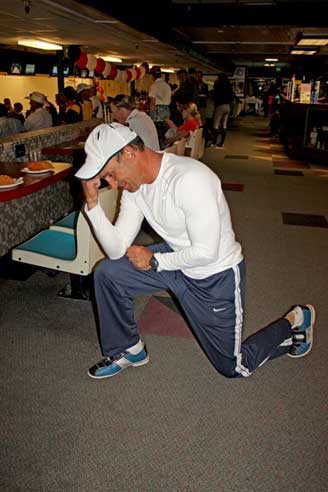 Derek Gray 'Tebowing' in the bowling alley.