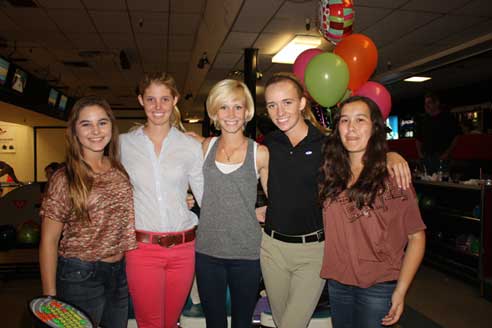 Citrus Hill Farms bowling team poses with balloons.