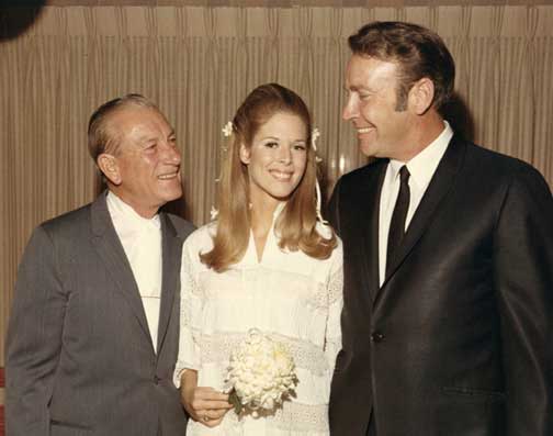 Singer Hoagy Carmichael with John and Tish Quirk on their wedding day.