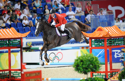 McLain Ward and Sapphire in the colorful 2008 Olympic show jumping ring.