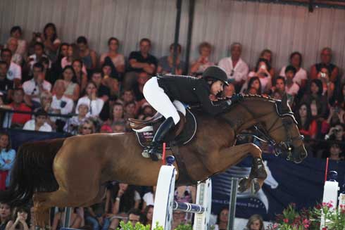 USA rider Laura Kraut clears a vertical jump on Teirra.