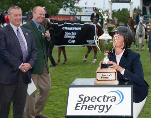 Reed Kessler kisses her trophy.