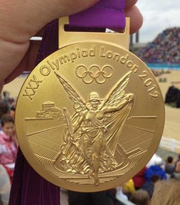 Close up of an Olympic Gold Medal medallion.