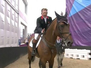 Nick Skelton gives Big Star a pat following their round.