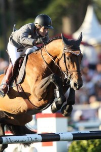 Cantano displays a very tight front-end as Meredith-Michaels-Beerbaum pilots the horse over a jump.