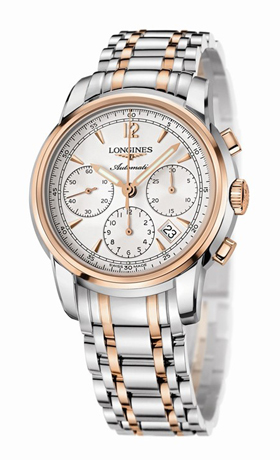 Men's gold and stainless steel Longines watch.