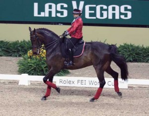 Debbie McDonald rides an exhibition in Spanish costume.