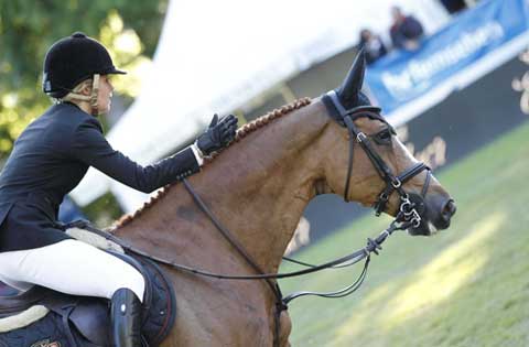 Edwina Tops-Alexander gives Cevo Itot du Chateau a well-deserved pat on the neck.