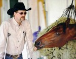 Mine That Bird wags his tongue at trainer Chip Woolley