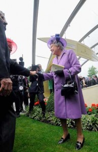 Queen Elizabeth is a regal sight in a lavender coat and hat at Royal Ascot.