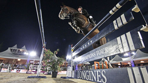 Marcus Ehning and Plot Blue seen from below in wide angle at the GCT Cannes.