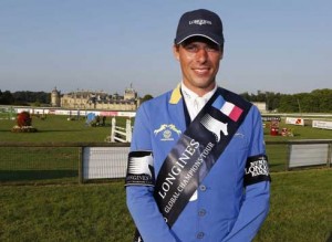 Portrait of Christian Ahlmann wearing his GCT leading rider sash.