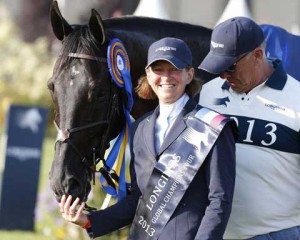 Beezie Madden gets a nuzzle from Cortes C.