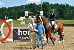 Victoria Colvin accepts her hunter championship.