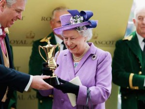 Queen Elizabeth II holds her trophy at Royal Ascot.