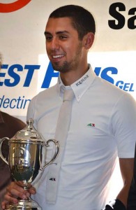 Nayel Nassar holds his Zoetis $1 Million trophy