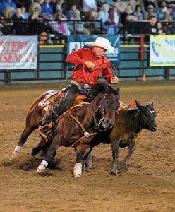 Doug Williamson looks spiffy in a red shirt on his bay horse at the Magnificent 7 competition.