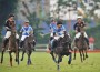 Polo player Ameer Jumabhoy charges forward on his horse in an action-packed chukker.