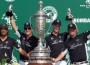 The Lucchese polo team stands before the formidable Pacific Coast Open trophy.