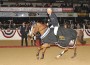 Rich Fellers takes his chestnut stallion Flexible on a victory gallop after winning the Grand Prix at the 2011 Sacramento International Horse Show.