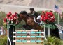 Rider Susan Hutchison and her horse Cantano sail over a jump in San Juan Capistrano.