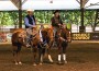 Winner and reserve champ astride their horses at Project Cowboy.