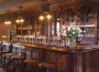 Interior of wood-paneled bar at the Diamond Mills Hotel and Tavern