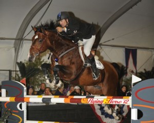 Close-up of Duncan McFarlane and his incredibly athletic bay horse, Mr. Whoopy, sailing over a jump.