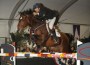 Close-up of Duncan McFarlane and his incredibly athletic bay horse, Mr. Whoopy, sailing over a jump.