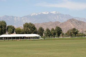 Expanse of green punctuated by the white tent of the clubhouse at the Eldorado Polo Club