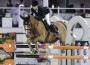 Edwina Tops-Alexander pilots her small chestnut gelding over an oxer.