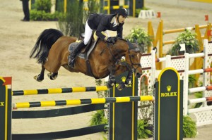 Switzerland's Steve Guerdat soars over the Rolex oxer at the World Cup Finals.