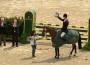 William Fox-Pitt brandishes his Rolex watch at the trophy ceremony.