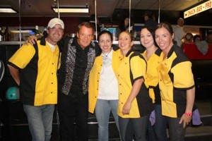 TES Honey Badgers bowling team in their yellow and black honey bee shirts.