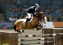 Rich Fellers and Flexible soar over a giant oxer.